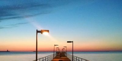 Image of Lake Huron viewed from a pier before sunrise