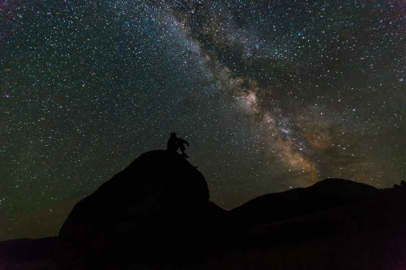 man looking at the Milky Way