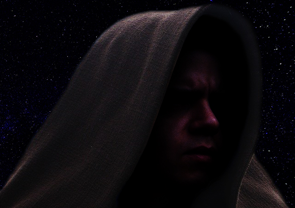 Cosplay image of a Star Wars Jedi set against a starry sky