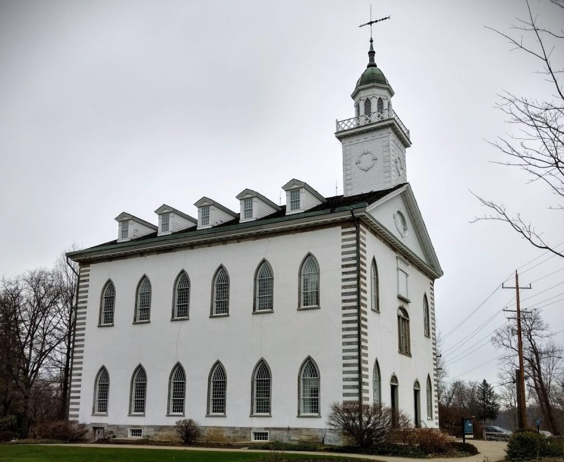 Kirtland Temple, first temple of Mormonism, as seen from the side on a cloudy day in 2018
