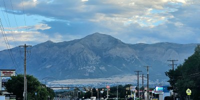 Ben Lomond Mountain, as seen from Wall Avenue in Ogden, Utah, on a partly cloudy day